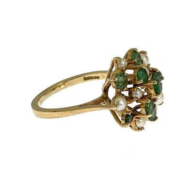 Lot 3 - A 9ct gold emerald and split pearl cluster ring