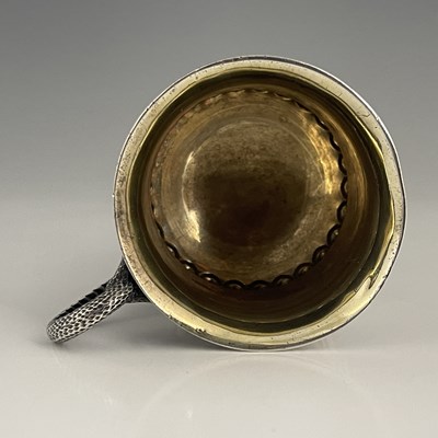 Lot 35 - A George III silver mug, in the Regency style,...
