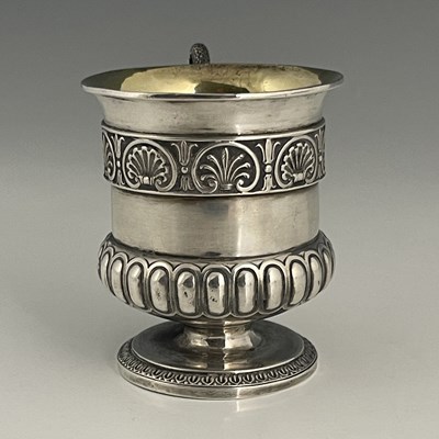 Lot 35 - A George III silver mug, in the Regency style,...