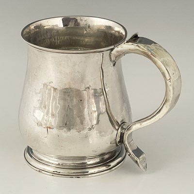 Lot 39 - A George II silver mug, of squat baluster form,...