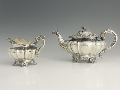 Lot 42 - A William IV silver teapot and milk jug, each...
