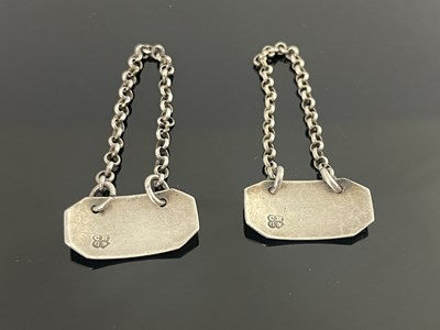 Lot 79 - A pair of George IV silver condiment labels for Anchovy and Tarragon