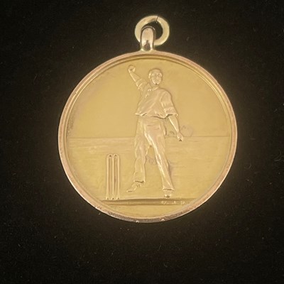 Lot 392 - A George V 9ct gold cricket fob, of circular...