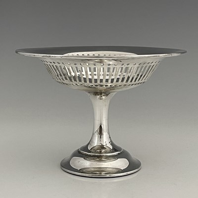 Lot 148 - Asprey. 
An Edwardian silver tazza, the bowl...