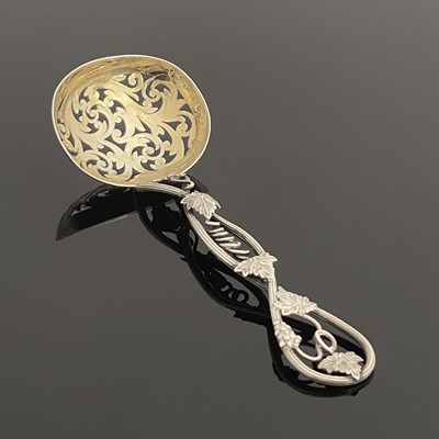 Lot 164 - A Victorian silver naturalistic sifting spoon,...