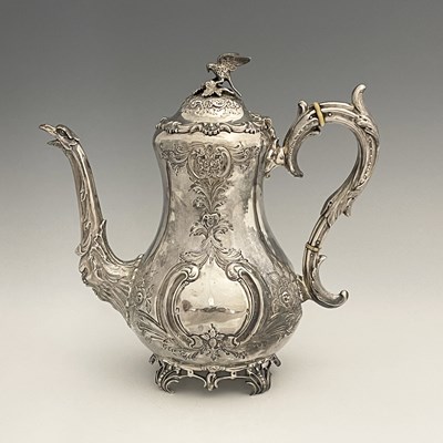 Lot 231 - An Edwardian silver coffee pot, of baluster...