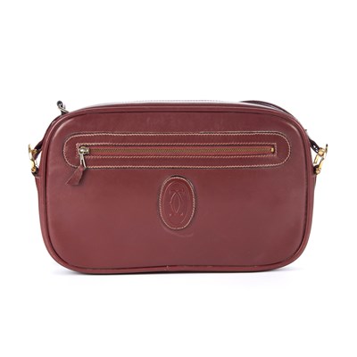 Lot 26 - Cartier, a vintage Bordeaux leather camera bag,...