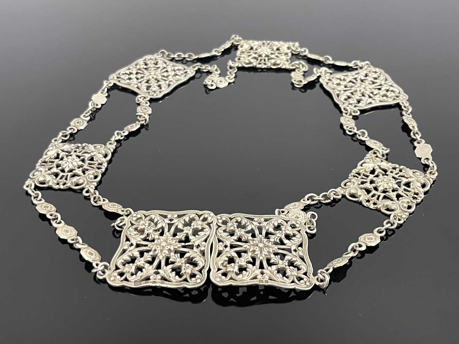 Lot 36 - A Victorian silver nurse belt, Lawrence...