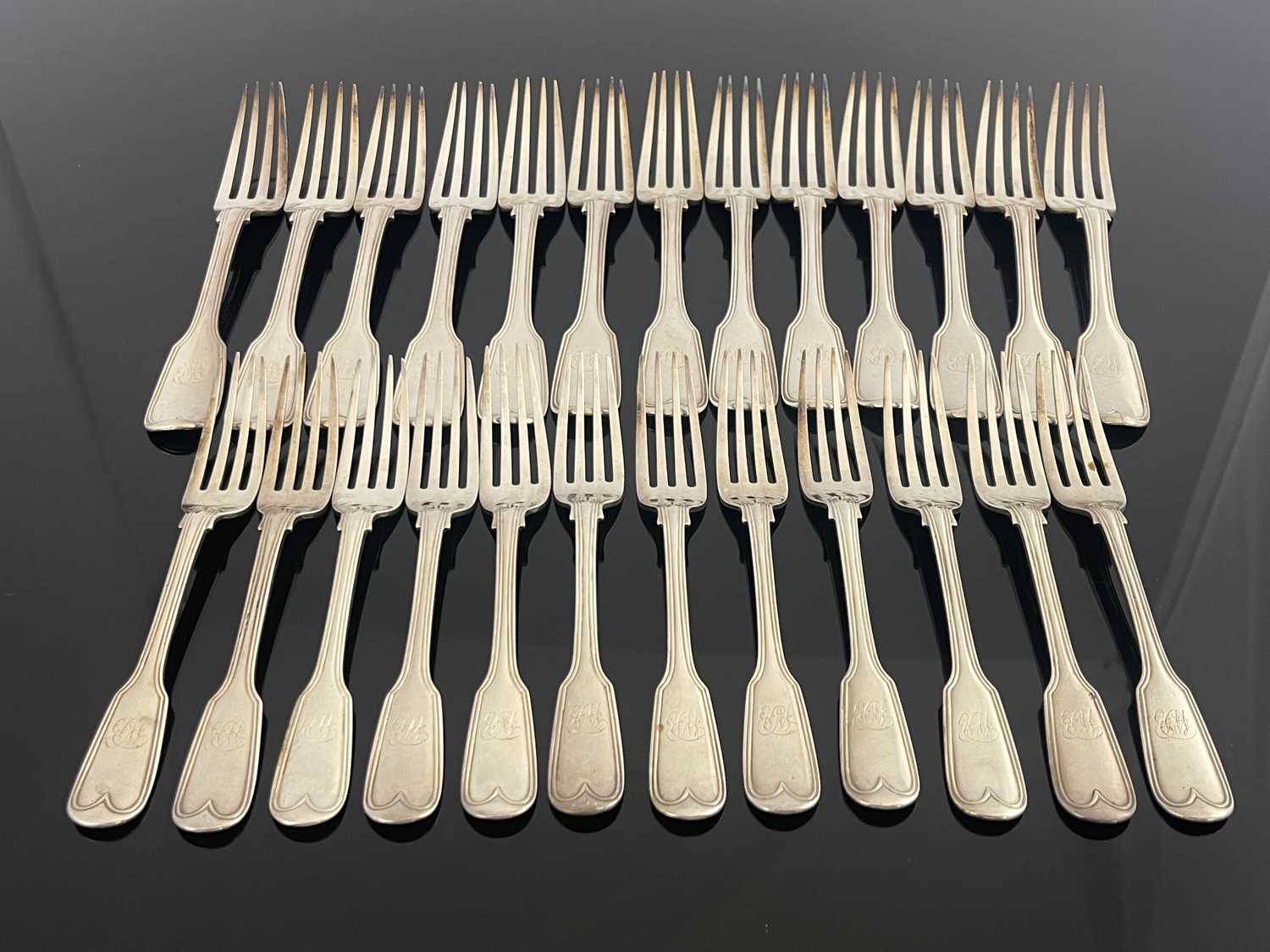 Lot 40 - A part canteen of Victorian silver flatware,...