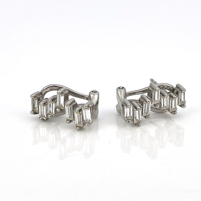 Lot 20 - A pair of 14k white gold earrings set with...