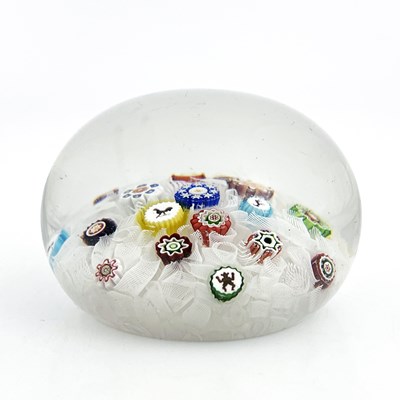 Lot 513 - Baccarat, a Gridel spaced millefiori glass...