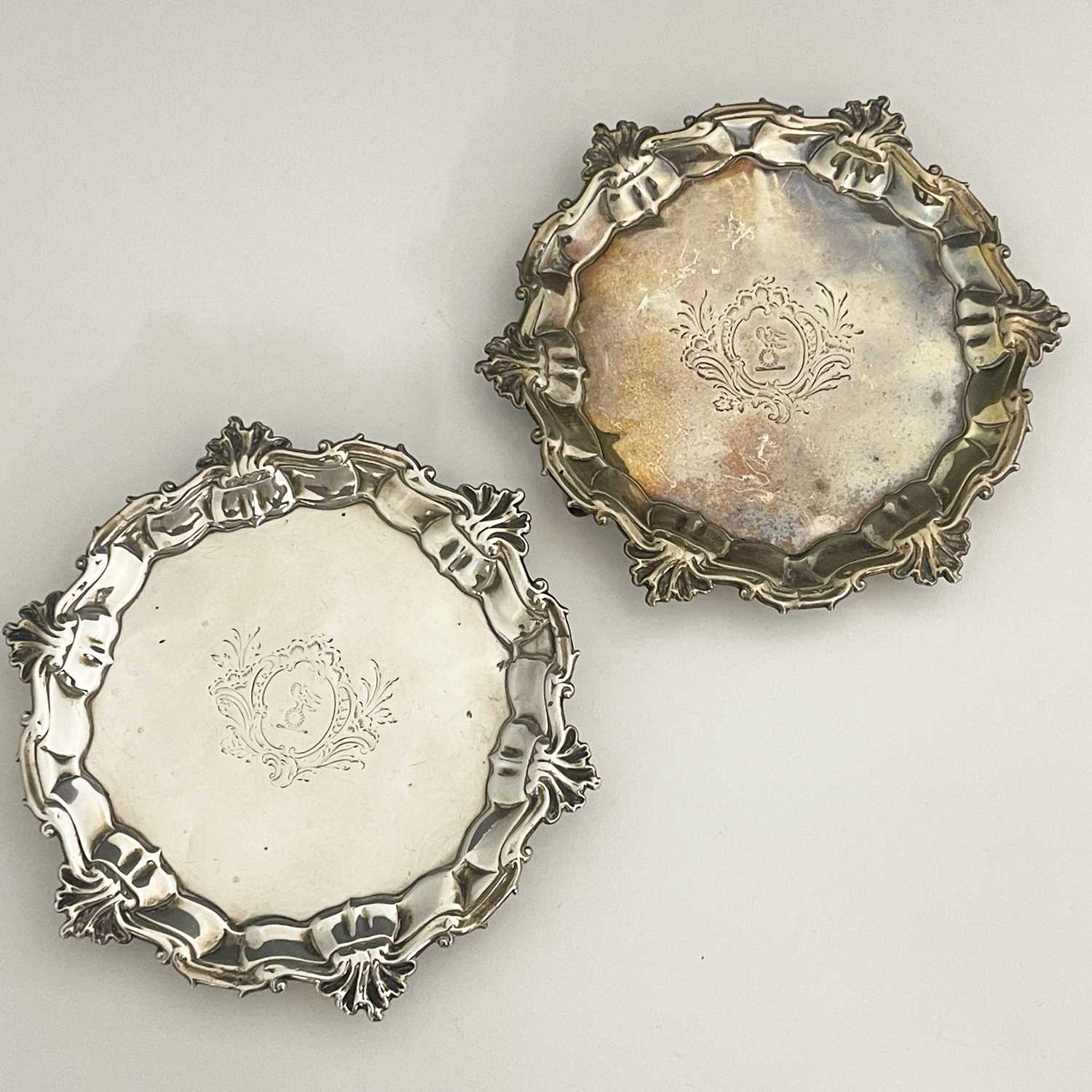 Lot 57 - A pair of George II silver card trays or...