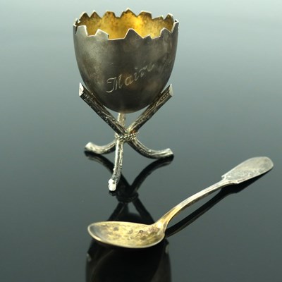 Lot 52 - A Finnish novelty silver egg cup and spoon,...