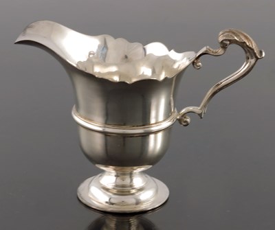 Lot 57 - An Elizabeth II Irish silver jug, Royal Irish...
