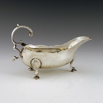 Lot 58 - A George III Scottish Provincial silver sauce...