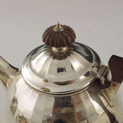 Lot 65 - A George VI silver three piece tea set, Barker...
