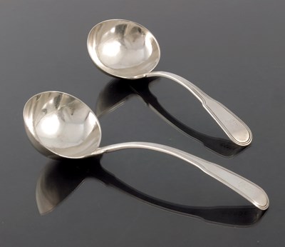 Lot 66 - A pair of George III silver sauce ladles,...