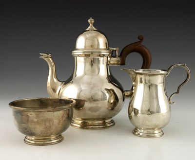 Lot 85 - A George V silver three piece tea set, F C...