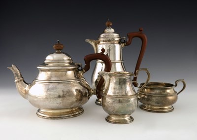 Lot 99 - A George VI silver four piece tea set, F C...