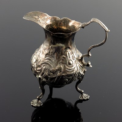 Lot 110 - An early George III silver cream jug, Samuel...