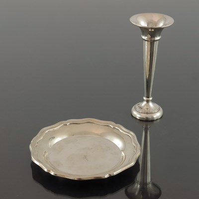 Lot 115 - An Elizabeth II silver pin dish and a trumpet...