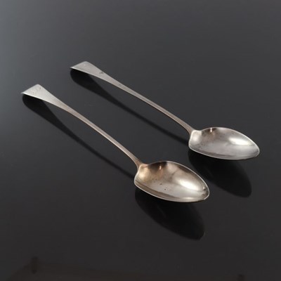 Lot 121 - A pair of George III silver basting spoons,...