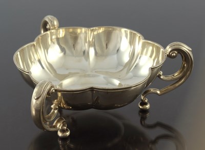 Lot 131 - A George VI silver three handled bon bon dish,...