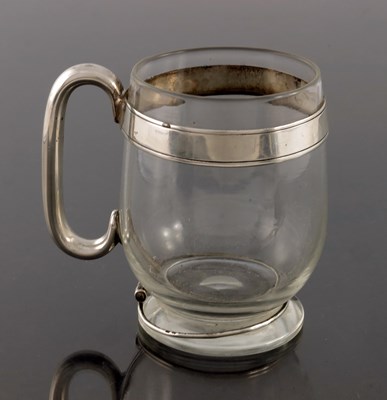Lot 144 - A Victorian silver mounted glass mug, John...