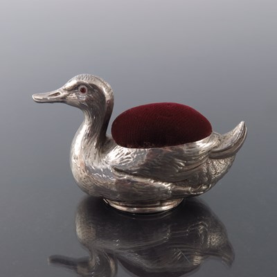 Lot 158 - A George V novelty silver pin cushion,...
