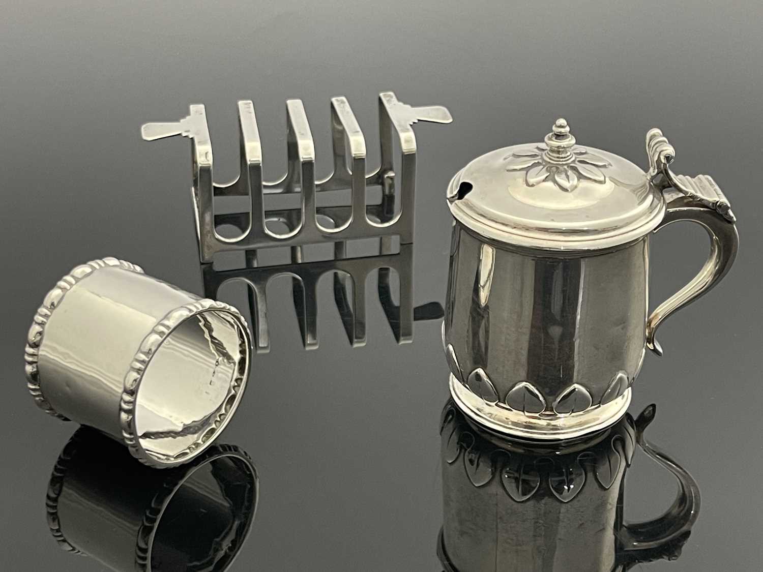 Lot 58 - A George V silver mustard pot, Fattorini and...
