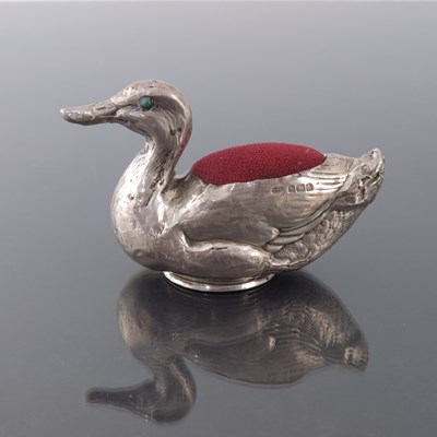 Lot 182 - An Edwardian novelty silver pin cushion,...
