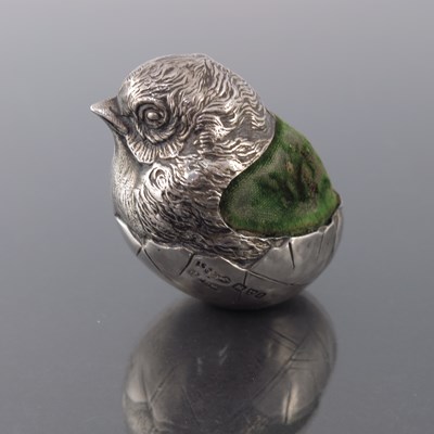 Lot 186 - An Edwardian novelty silver pin cushion,...
