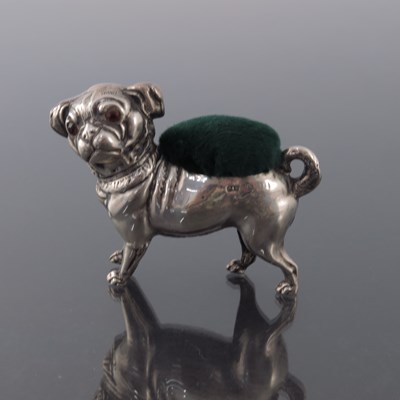 Lot 188 - An Edwardian novelty silver pin cushion,...