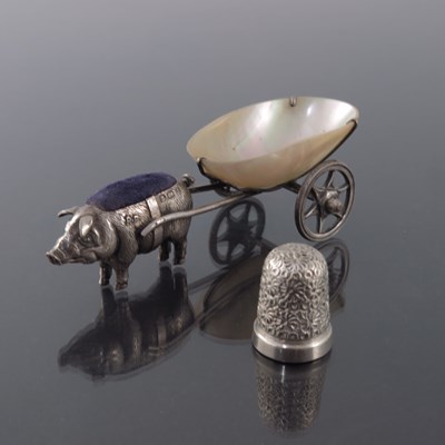 Lot 191 - A George V novelty silver pin cushion and...