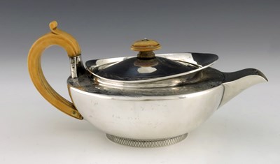 Lot 248 - A George III silver and ivory teapot, John...