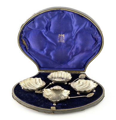 Lot 251 - A set of four Victorian silver salt cellars,...