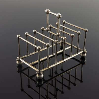 Lot 255 - After Christopher Dresser, a silver plated six...