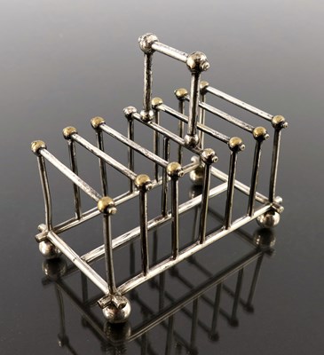 Lot 256 - After Christopher Dresser, a silver plated six...