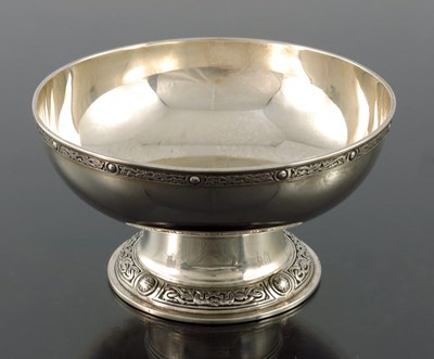 Lot 282 - An Arts and Crafts Iona style silver pedestal...