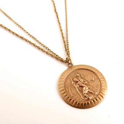 Lot 301 - A 9ct gold religious pendant, suspended from...