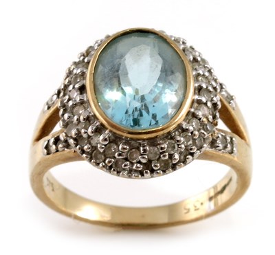 Lot 308 - A 9ct gold oval-shape aquamarine and...