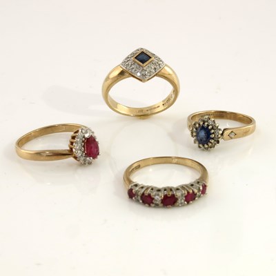 Lot 311 - Four 9ct gold ruby, sapphire and diamond dress...