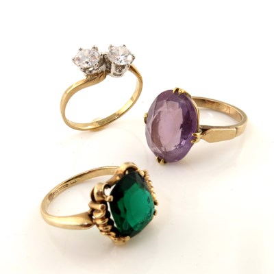 Lot 313 - Three 9ct gold gem-set rings, to include an...