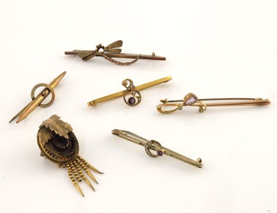 Lot 323 - Six gold, gem-set brooches, to include a...