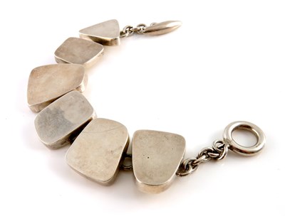 Lot 332 - A Modernist silver bracelet, designed as a...