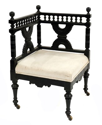 Lot 361 - An Aesthetic Movement ebonised corner chair,...