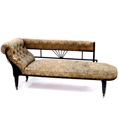 Lot 367 - An Aesthetic Movement ebonised chaise longue,...