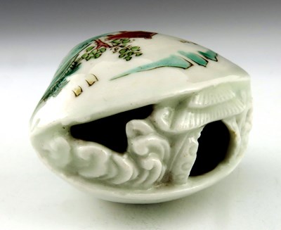 Lot 457 - A Japanese Hirado porcelain netsuke, Meiji...