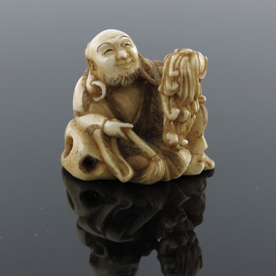 Lot 516 - ? A Japanese ivory okimono, Meiji period, 1868-...
