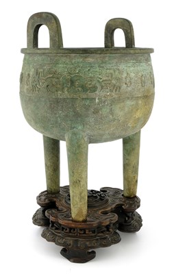 Lot 543 - A Chinese Archaistic bronze tripod ritual food...